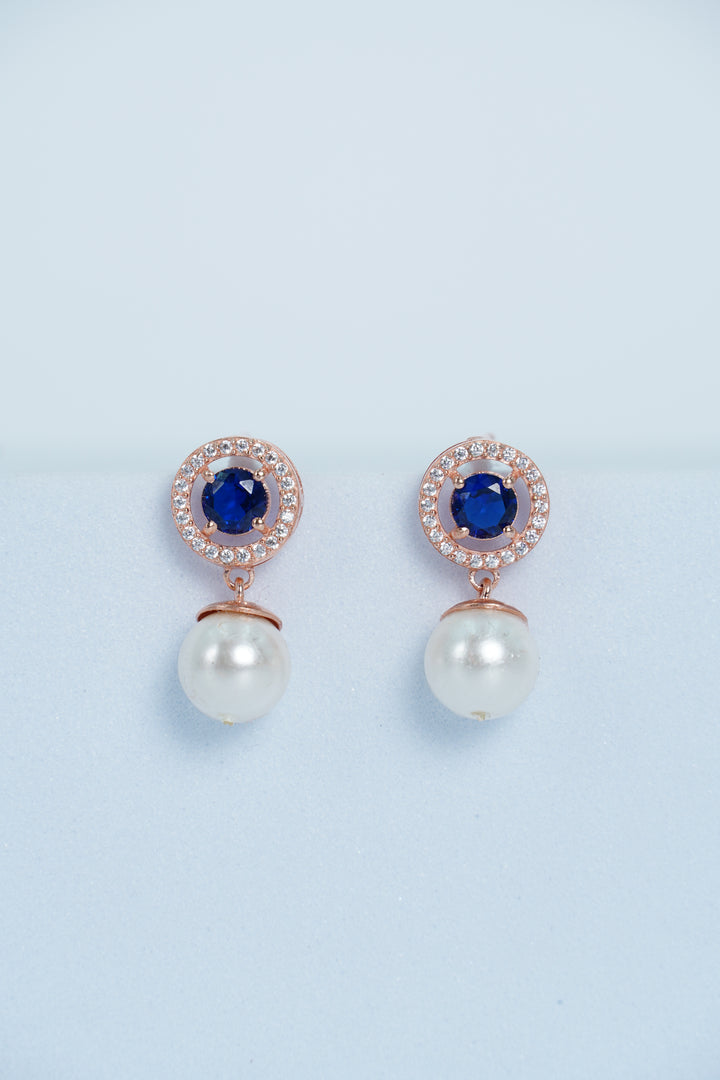 WHITE CRYSTALS FROM SWAROVSKI STUDDED,ROSE GOLD FINISH EARRINGS WITH PEARL